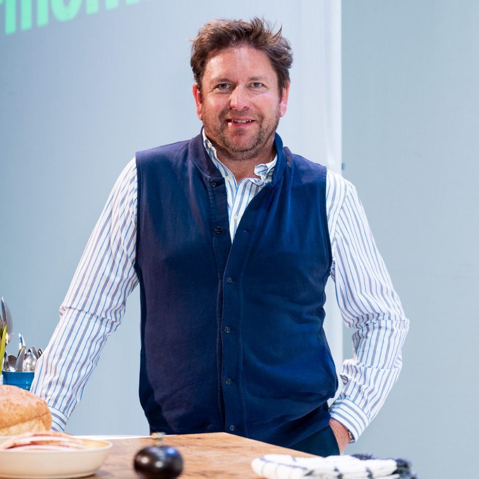 James Martin smiling onstage at the BBC Good Food Show Summer